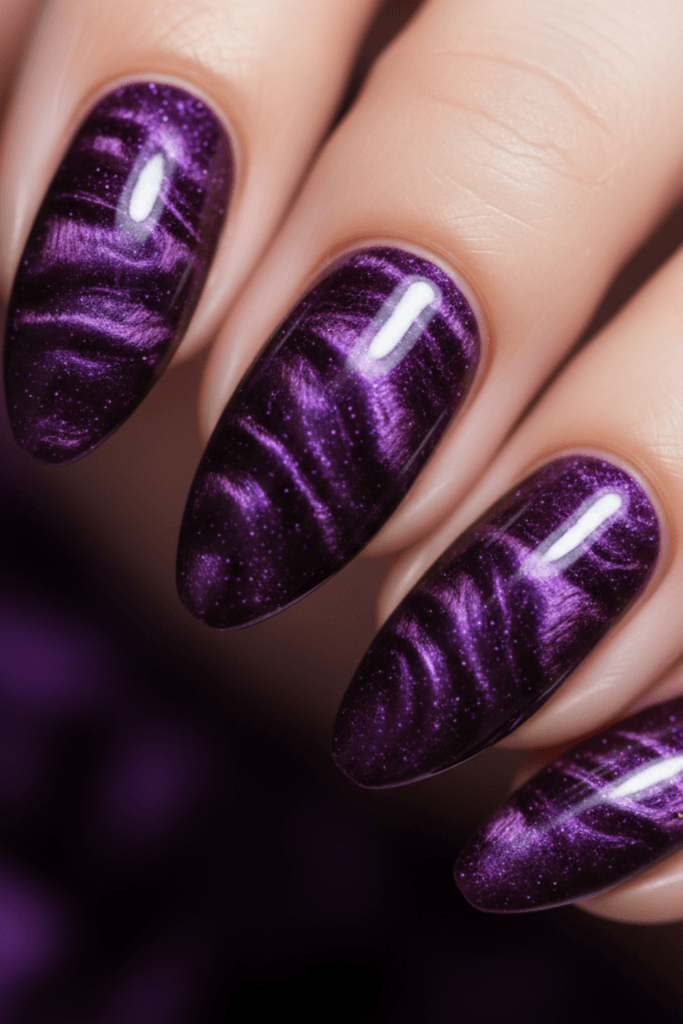 Purple velvet cat-eye magnetic gel nails with shimmering finish