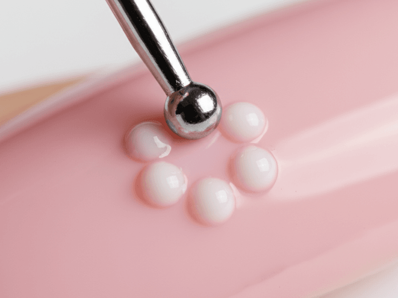 Creating a daisy flower on nails using a dotting tool