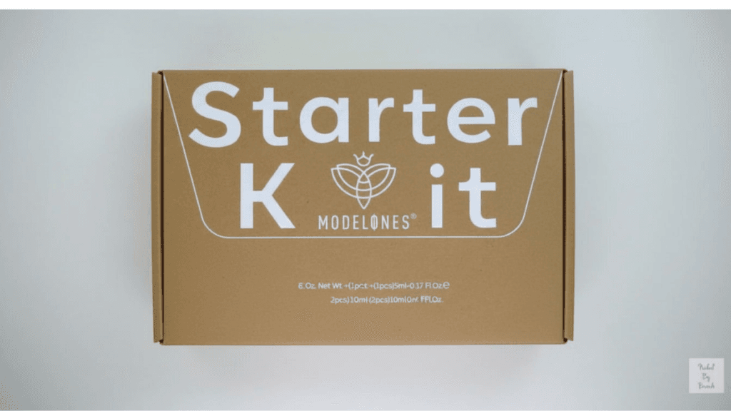 Modelones polygel nail kit with 48W U V light and 6 colors on a white marble surface 2026